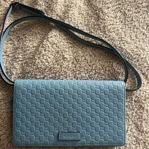 Gucci Blue Crossbody Bag with Textured Design and Long Strap